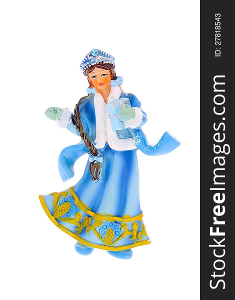 Christmas decoration figure of Snow Maiden in a bright blue and white dress with festive gift in hand. Blue eyes, brown hair color, plaited into a long braid. Christmas decoration figure of Snow Maiden in a bright blue and white dress with festive gift in hand. Blue eyes, brown hair color, plaited into a long braid.