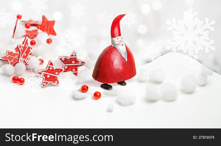 A chubby Santa Claus standing with a stars ribbon around him on white background. A chubby Santa Claus standing with a stars ribbon around him on white background