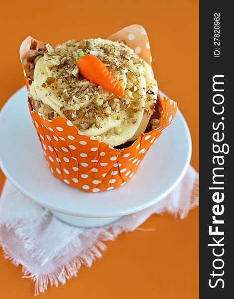 Carrot Cake Cupcake with polka dot wrapper