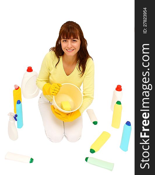 Woman holding plastic bucket with water in it and  many plastic bottles around her isolated on a white background. Woman holding plastic bucket with water in it and  many plastic bottles around her isolated on a white background