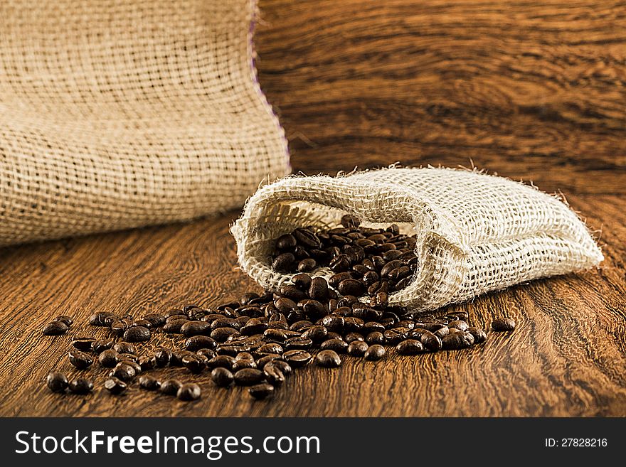 Closeup of coffee beans in burlap bag