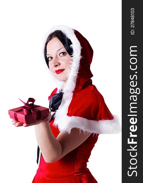 Brunette girl with a gift for Christmas isolated background