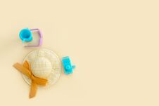 Free Sunglasses, Straw Hat, Toy Camera And Toy Glass With A Straw On A Pale Beige Background, Vacation Content From Copy Space Stock Image - 278438501
