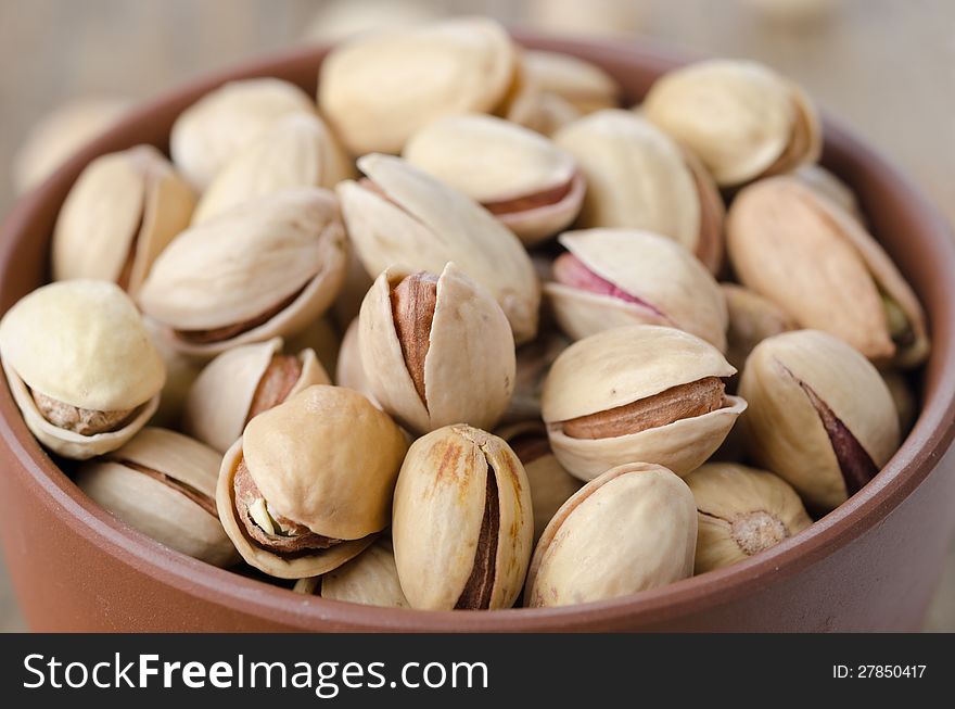 Closeup of a bowl of pistachio nuts