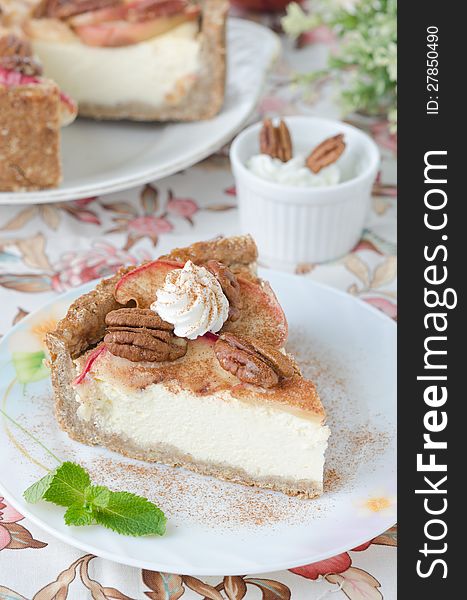 Slice of cheesecake with apples