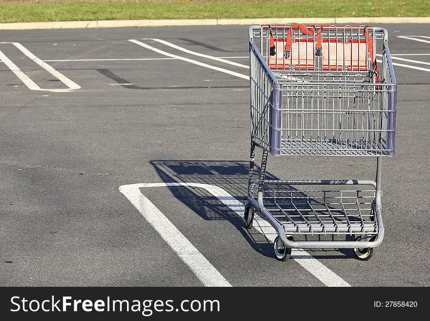 SHOPPING CART TROLLY IN A PARKING LOT