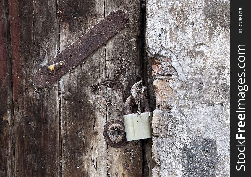 Lock on old wooden door
