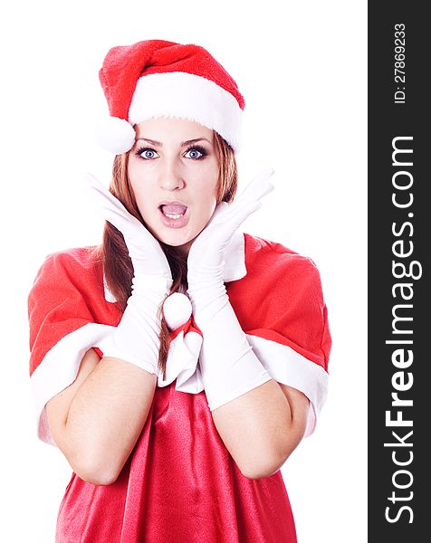 Surprised christmas woman wearing a santa hat smiling isolated over a white background