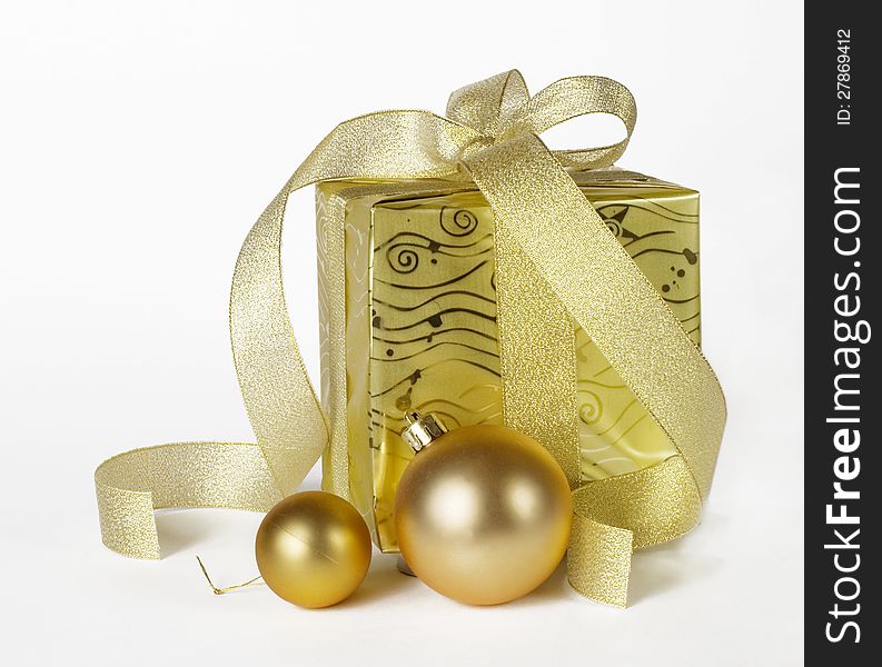 Gifts box with Christmas balls isolated on white