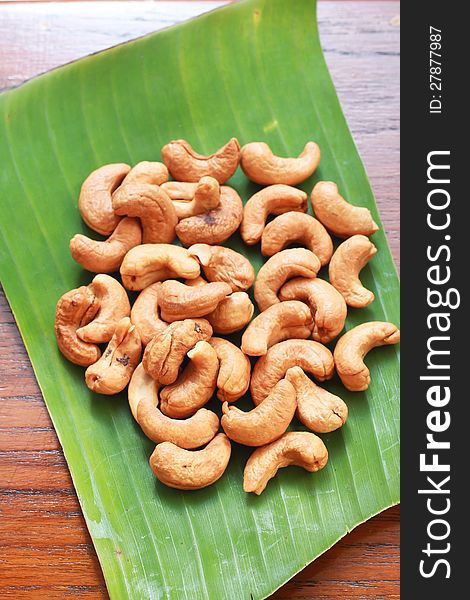 Close up of cashew nuts on banana leaf