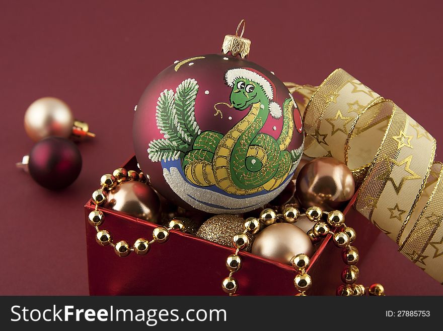 Christmas still life with color ball and gift box. Christmas still life with color ball and gift box