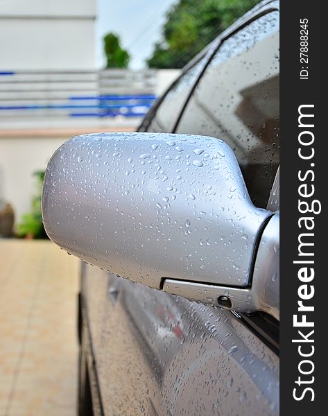 Water droplet after raining on car side mirror