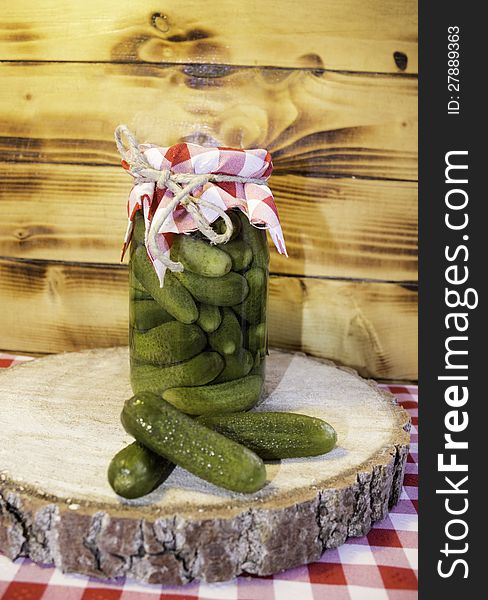 Glass jar of pickled cucumbers