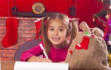 Happy Child Writes Letter To Santa Claus Stock Image