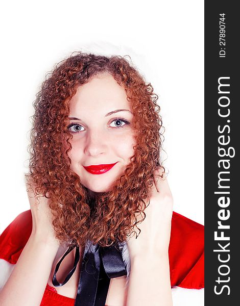 Portrait of pretty curly girl dressed as Santa isolated