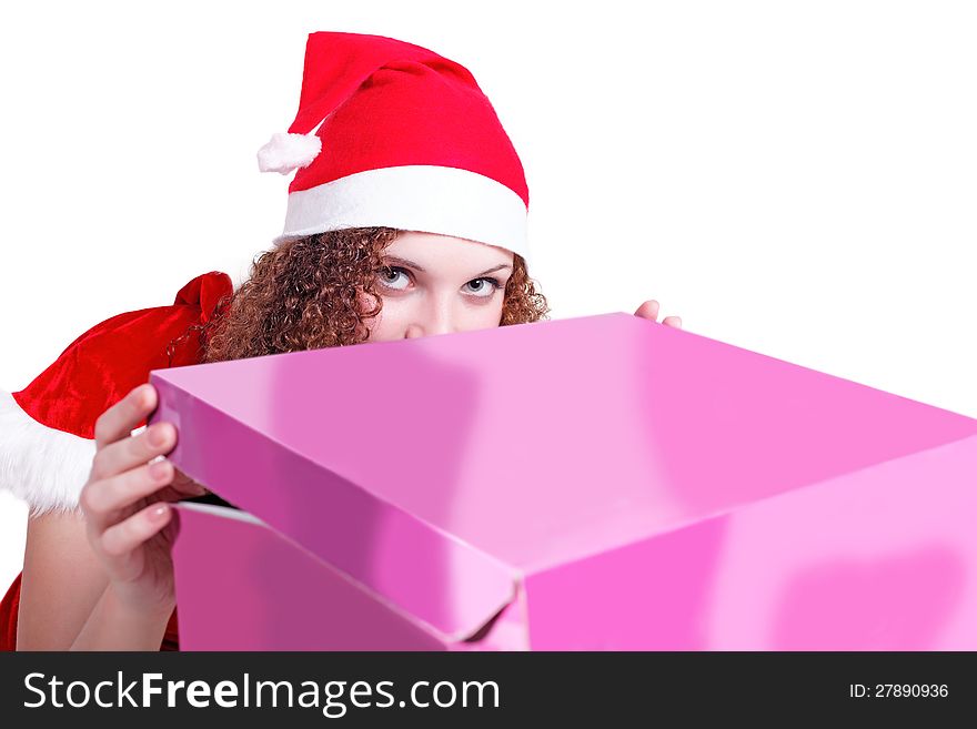 Pretty curly girl looks like Santa gift isolated