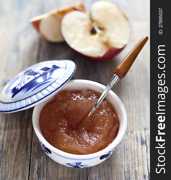 Apple jam in a blue jar