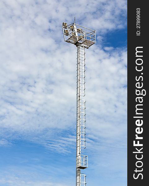 The Stadium Spot-light tower over Blue Sky