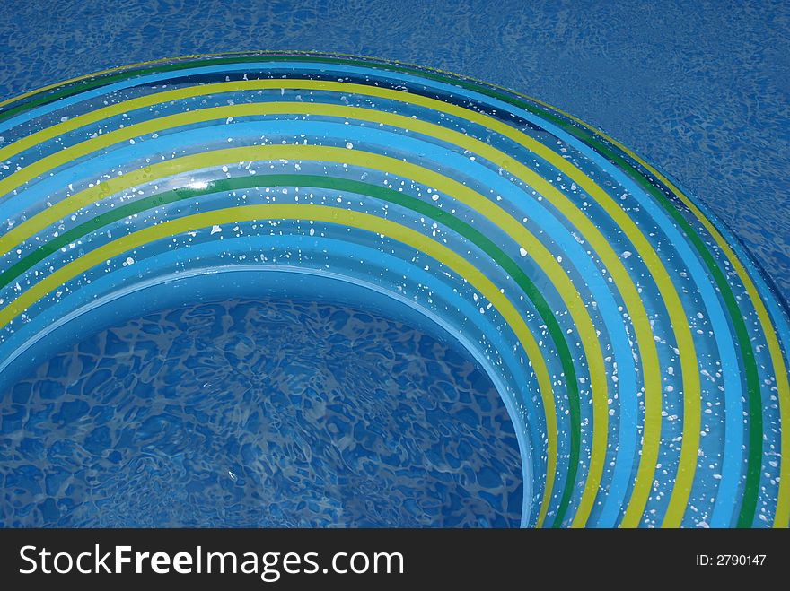 A swimming-belt in a swimming-pool. A swimming-belt in a swimming-pool.