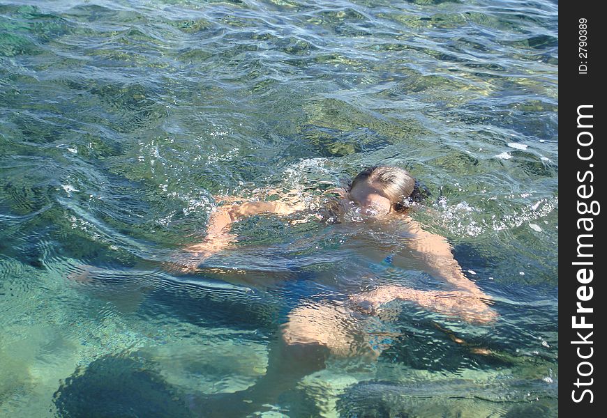 Girl diving in the sea. Girl diving in the sea