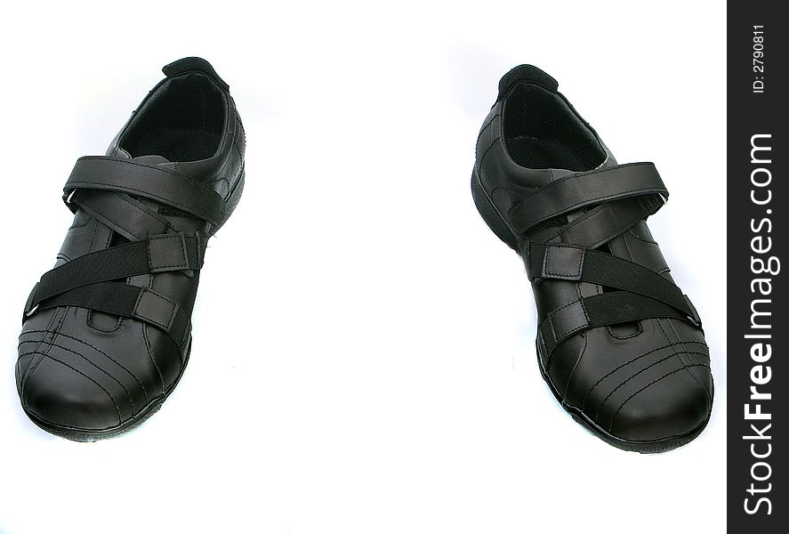 A black pair of man shoes