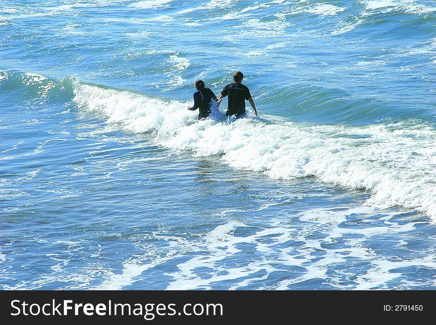 Couple on their honeymoon at the beach. Couple on their honeymoon at the beach.