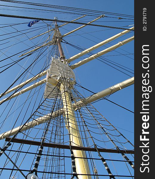 Big and old sailing ship in a harbour of Gdynia, Poland. Satrboard of a ship. Big and old sailing ship in a harbour of Gdynia, Poland. Satrboard of a ship.