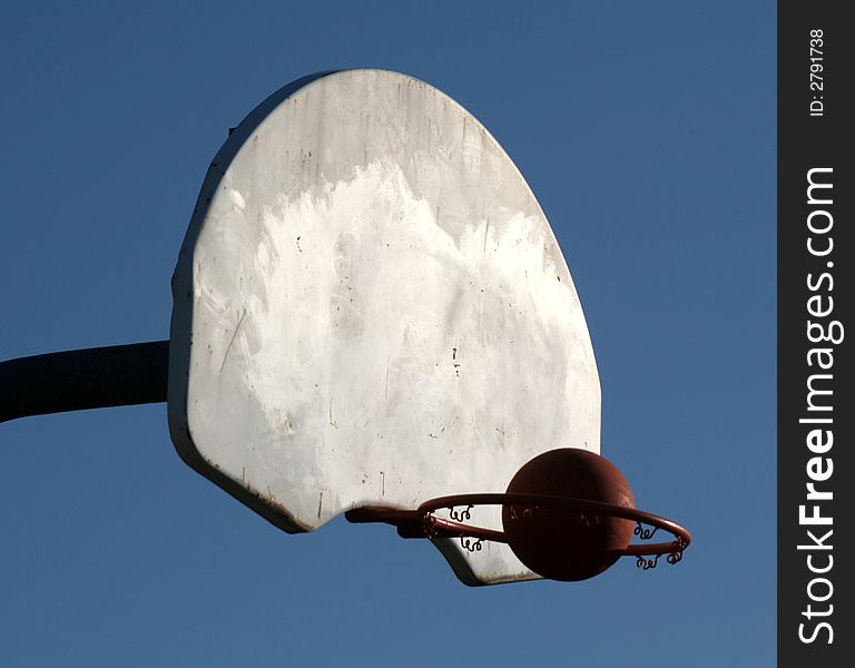 A basketball headed for the hoop. A basketball headed for the hoop.