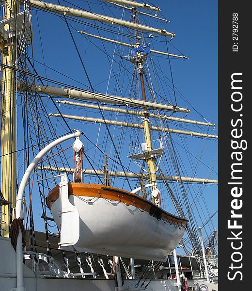 Big and old sailing ship in a harbour of Gdynia, Poland. Life boat. Big and old sailing ship in a harbour of Gdynia, Poland. Life boat.