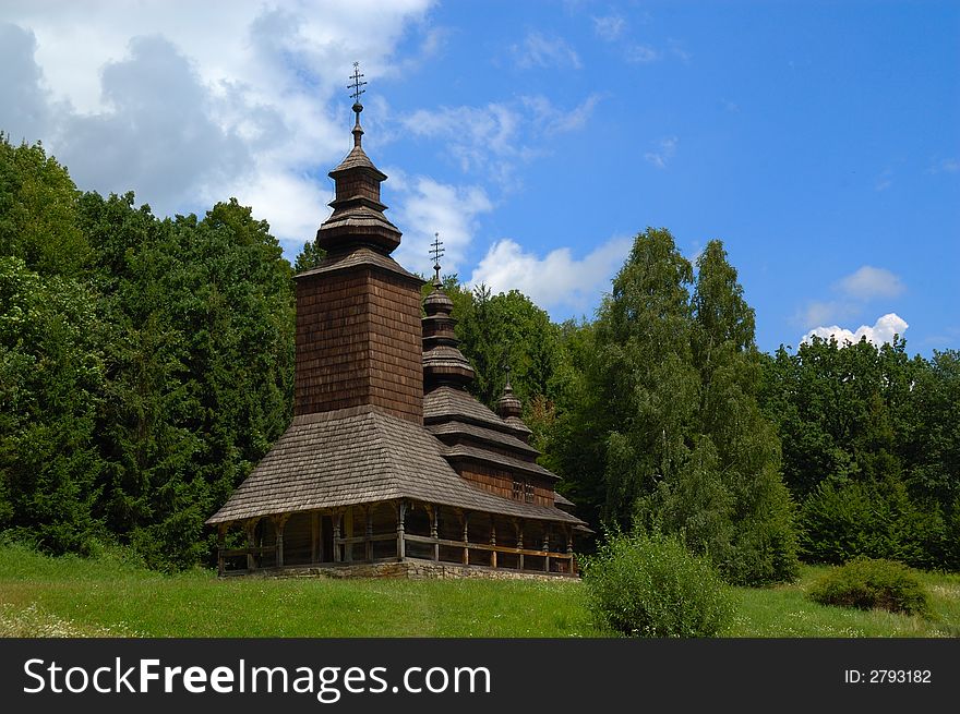 Old western Ukrainian wooden orthodox church  near the forest. Old western Ukrainian wooden orthodox church  near the forest