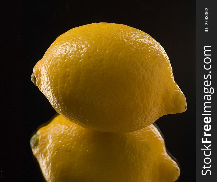 Reflection and Close up of a Lemon