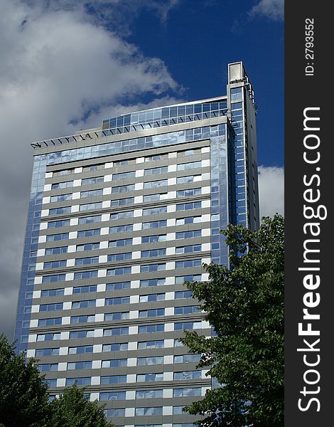 Fragment of modenr business building with blue sky