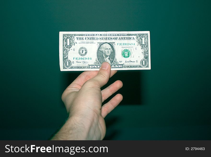 Dollar In A Hand