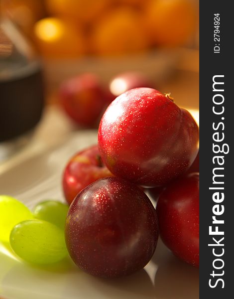 Fresh fruits, plum and grapes