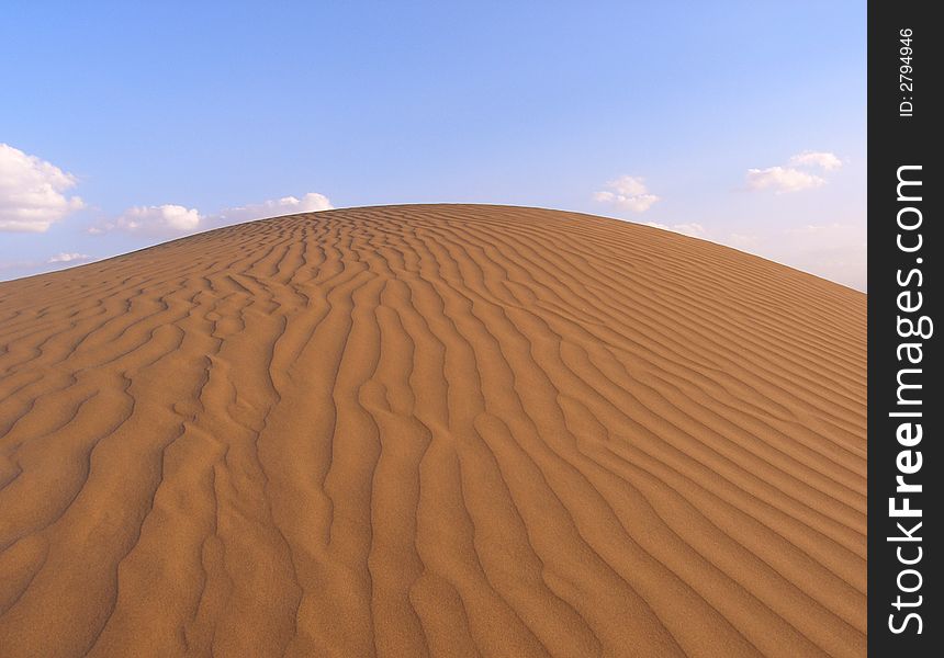 Sandy dunes waves in the desert. Sandy dunes waves in the desert