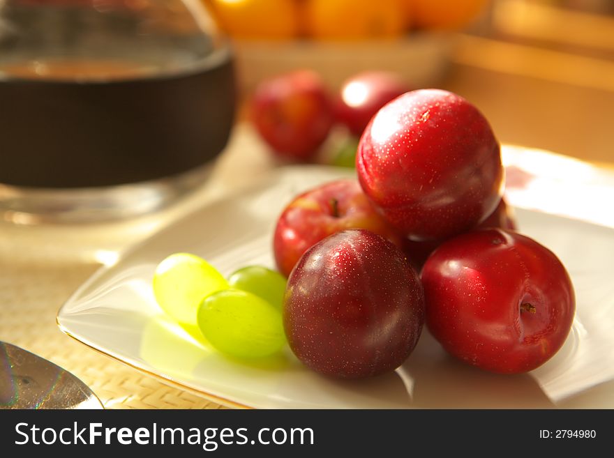 Fresh fruits, grapes and plums