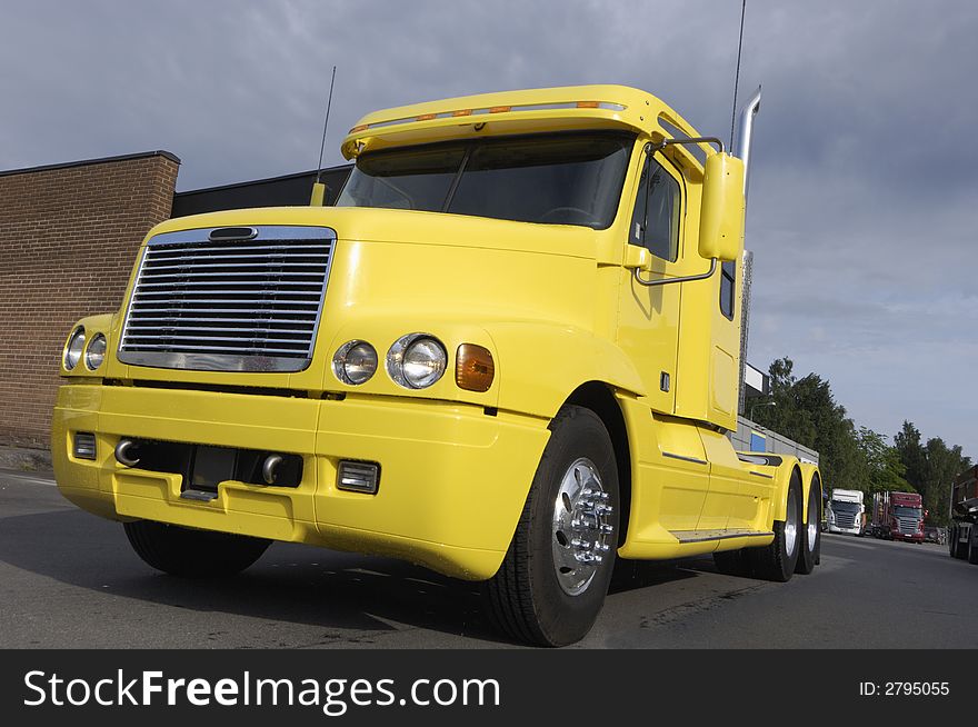 Large yellow truck, cabin typical American style. Large yellow truck, cabin typical American style