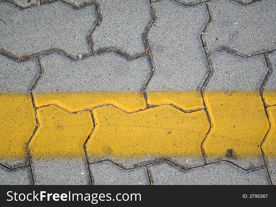 Yellow line on a road pavement