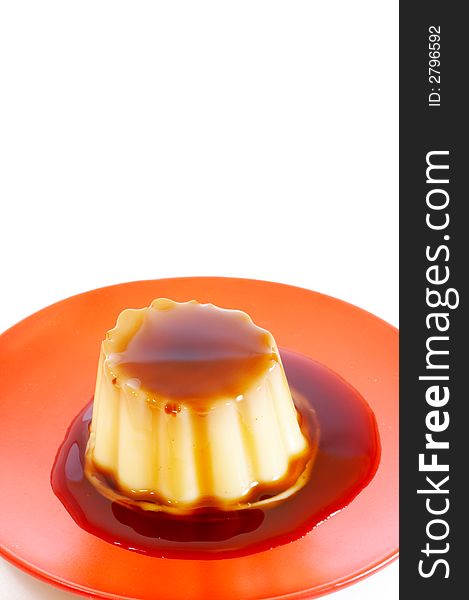 Creme Caramel On Red Plate