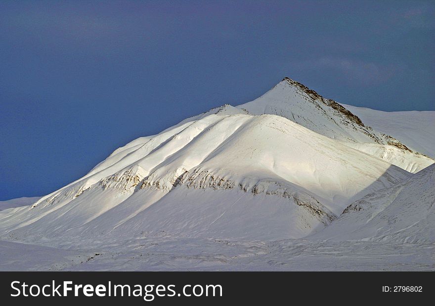 Mountain with snow on the island of Svalbard,Norway. Mountain with snow on the island of Svalbard,Norway