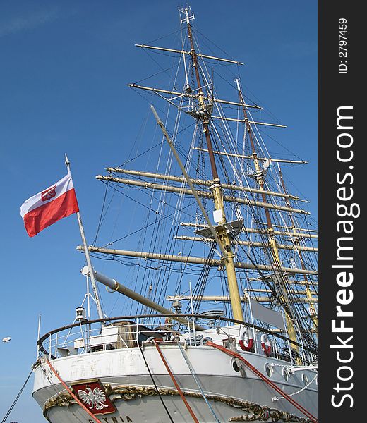 Big and old sailing ship in a harbour of Gdynia, Poland. Stern of a boat. Big and old sailing ship in a harbour of Gdynia, Poland. Stern of a boat.