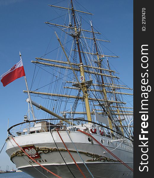 Big and old sailing ship in a harbour of Gdynia, Poland. Stern of a boat. Big and old sailing ship in a harbour of Gdynia, Poland. Stern of a boat.