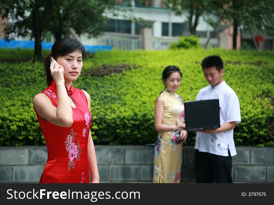 Three asian young people in garden. Three asian young people in garden