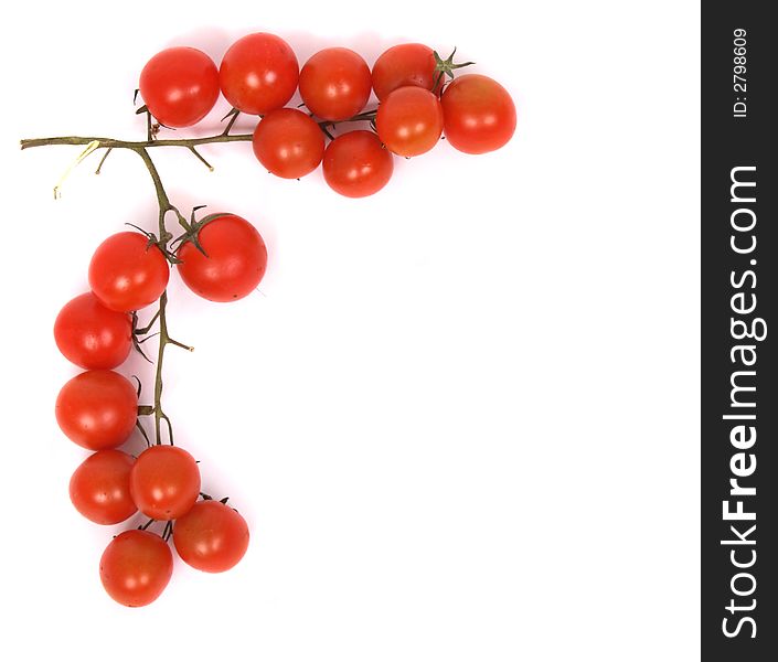Small red tomatoes on the white background. Small red tomatoes on the white background