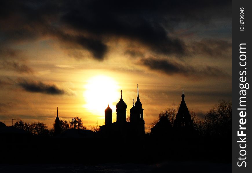 Ancient building. Wall. Tower. Church on the sunset. Ancient building. Wall. Tower. Church on the sunset