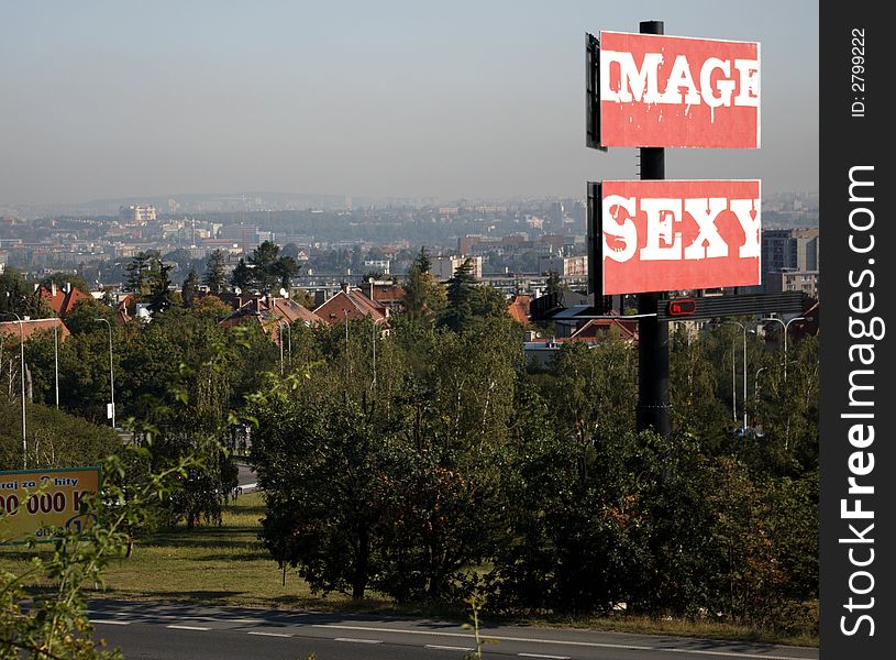 Two billboards, two words - image and sexy. Both are situated so it look like welcome sign of some city. Two billboards, two words - image and sexy. Both are situated so it look like welcome sign of some city.