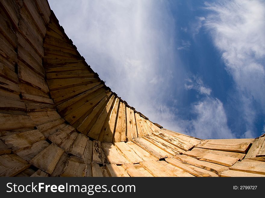 Wall or semi-hut. Wooden architecture day blue sky. Wall or semi-hut. Wooden architecture day blue sky.