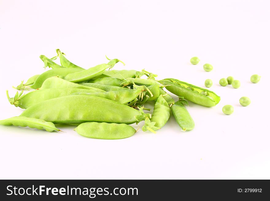 Close-up of green pea pods with depth of field