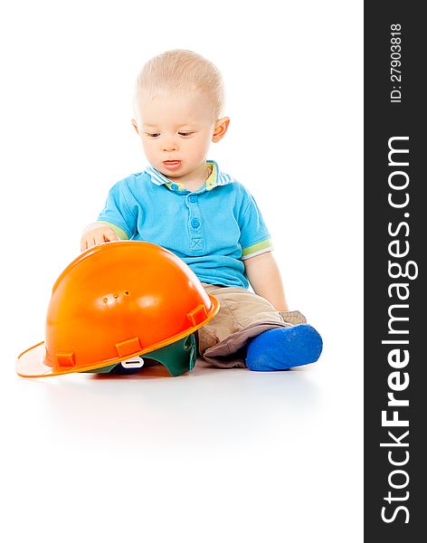Little boy with construction helmet. Little boy with construction helmet