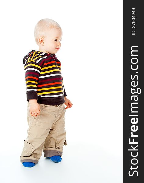 Beautiful little baby boy stands  on white background. Beautiful little baby boy stands  on white background